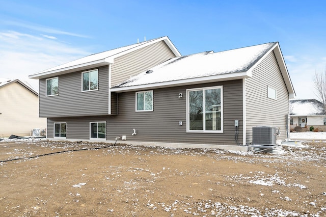 back of property with central AC unit