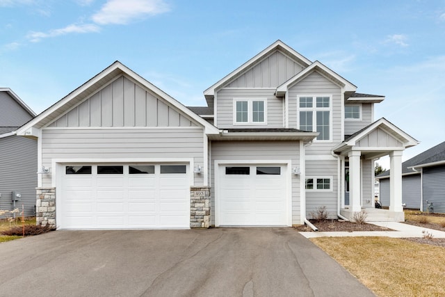 craftsman house with a garage