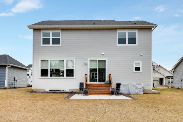 rear view of property featuring a patio area and a yard