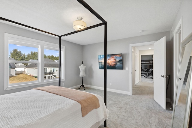 bedroom with light carpet