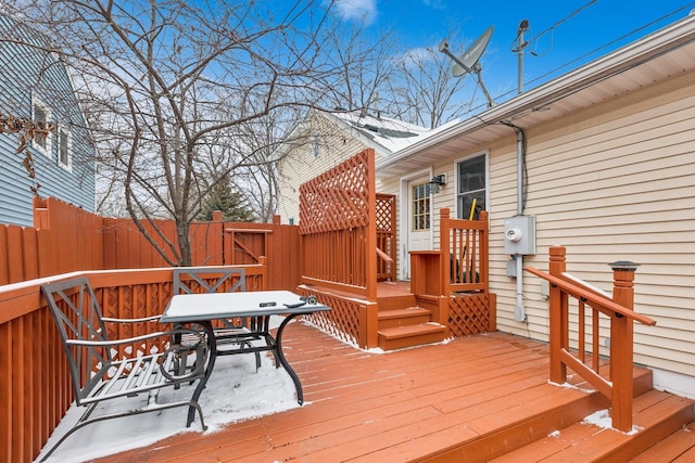 view of snow covered deck