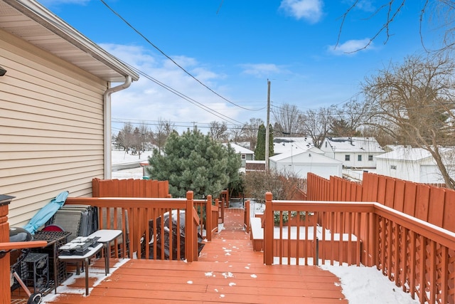 view of snow covered deck