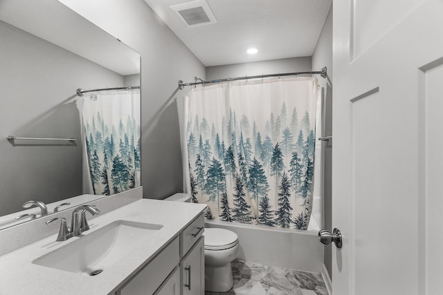 full bathroom with shower / bath combo with shower curtain, vanity, and toilet