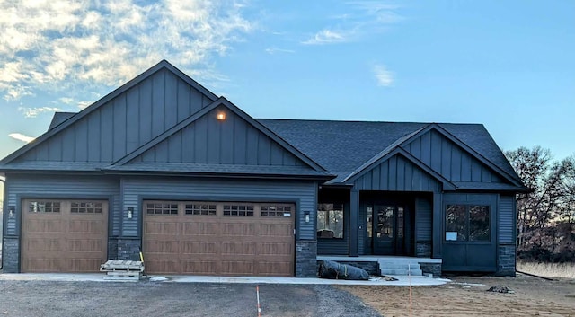 craftsman-style house featuring a garage