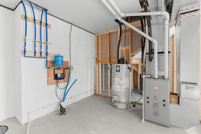 utility room featuring gas water heater