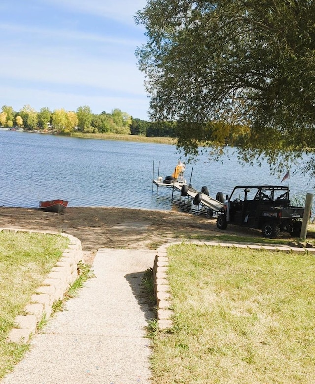 dock area featuring a water view