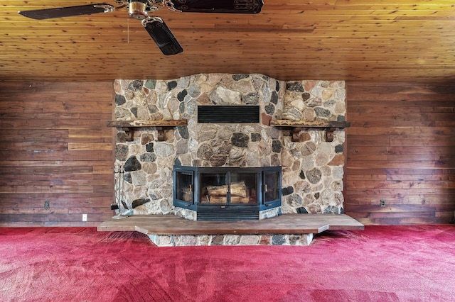 details featuring carpet, ceiling fan, and wooden walls