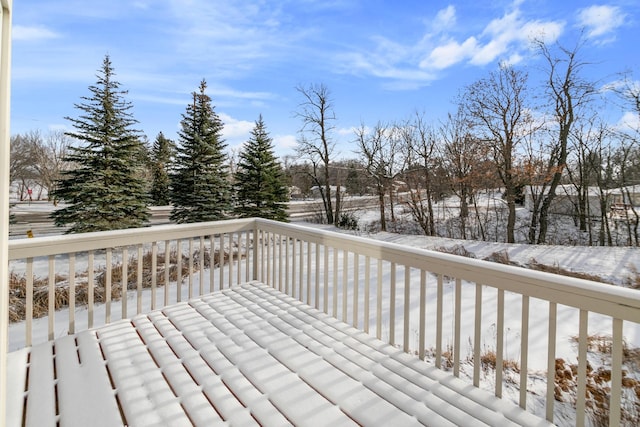 view of snow covered deck