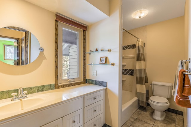 full bathroom featuring vanity, toilet, tile patterned flooring, and shower / bath combo