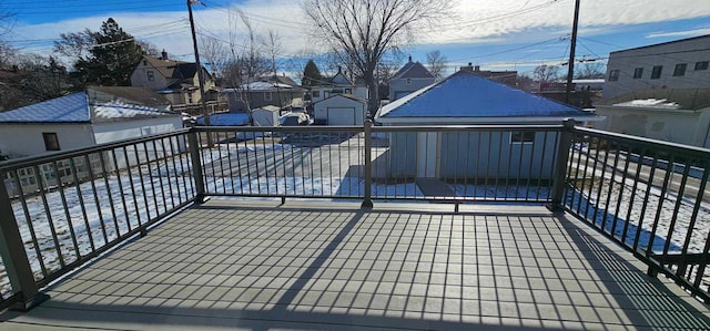 wooden deck with a shed