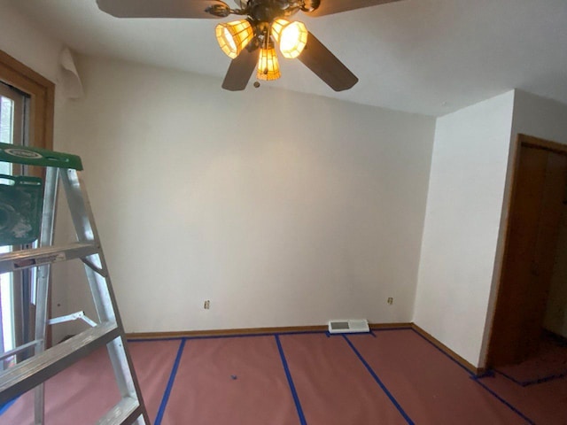 interior space featuring ceiling fan