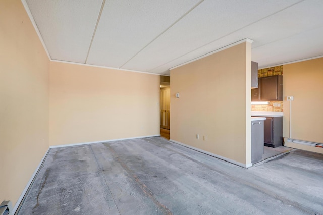 spare room featuring ornamental molding