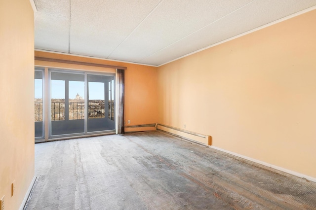 spare room featuring a textured ceiling and carpet