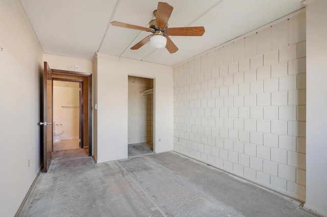 unfurnished bedroom featuring ceiling fan