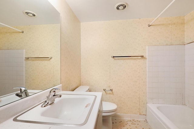 full bathroom featuring shower / tub combination, sink, tile patterned floors, and toilet