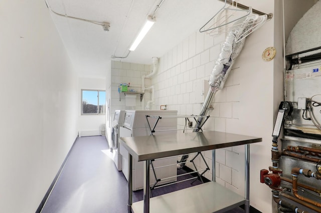 laundry room featuring independent washer and dryer