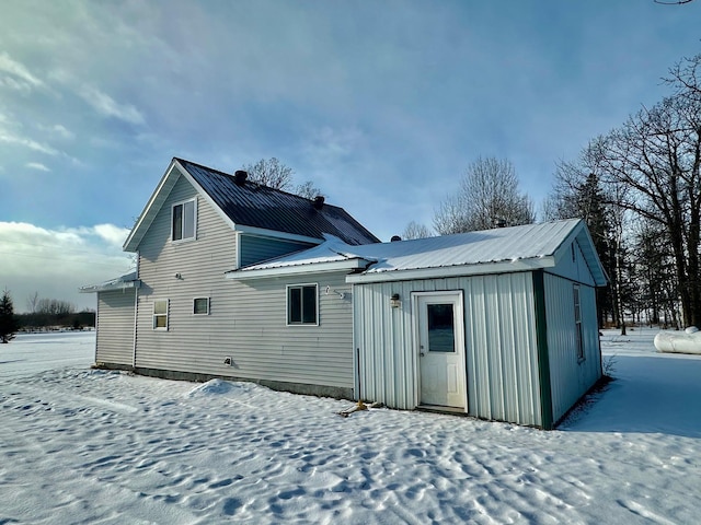 view of snow covered property