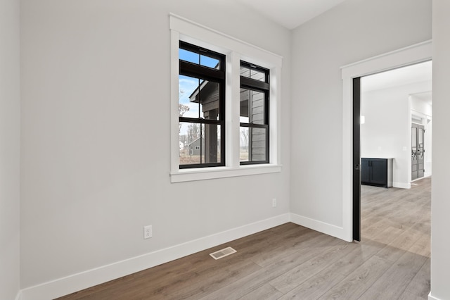 empty room featuring light hardwood / wood-style floors