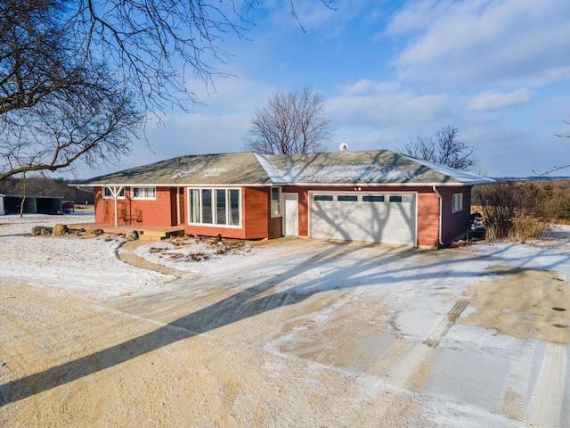 view of front of property featuring a garage