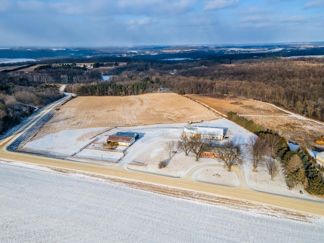 birds eye view of property with a rural view