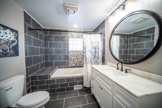 full bathroom with vanity, tile patterned flooring, toilet, and shower / bathtub combination with curtain