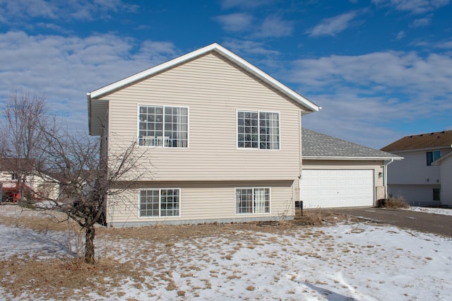 exterior space with a garage