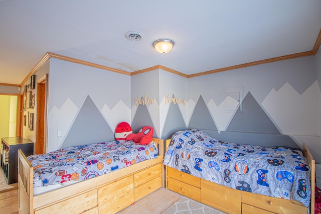 tiled bedroom featuring ornamental molding