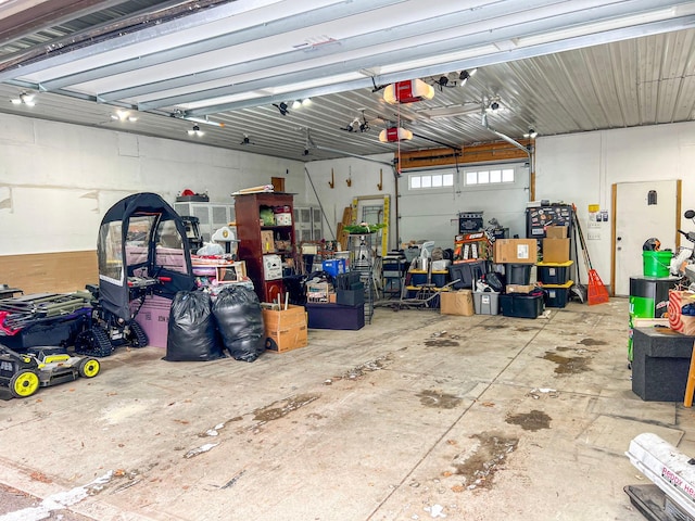 garage featuring a garage door opener