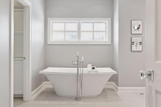 bathroom with a bathing tub