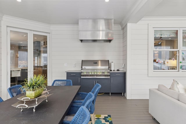 interior space featuring area for grilling and a wooden deck