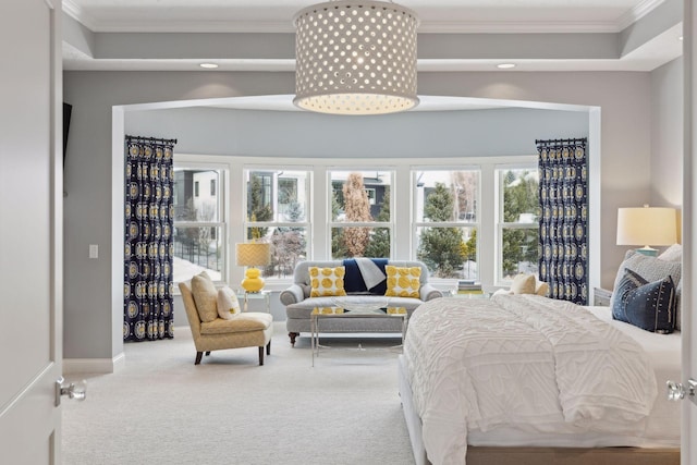 bedroom featuring carpet flooring, ornamental molding, and multiple windows