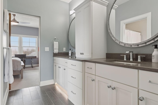 bathroom featuring vanity and ceiling fan