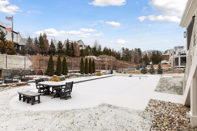 view of yard layered in snow