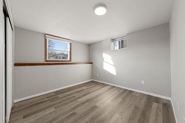 spare room featuring hardwood / wood-style flooring