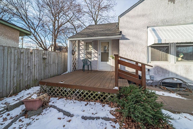 view of snow covered deck