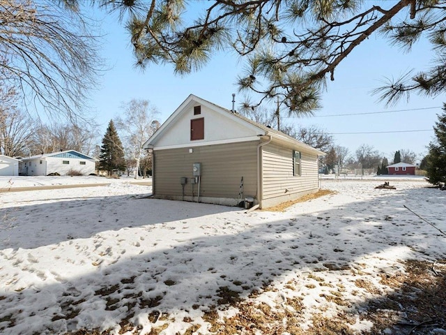 view of snow covered property