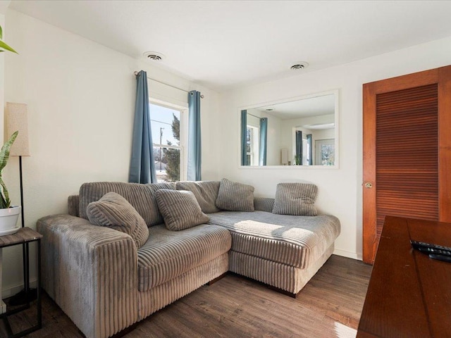 living room featuring dark hardwood / wood-style floors