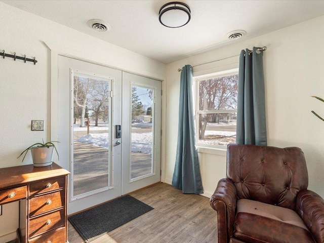 living area with light hardwood / wood-style floors