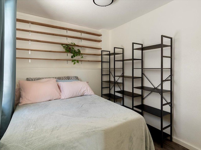 bedroom featuring hardwood / wood-style flooring