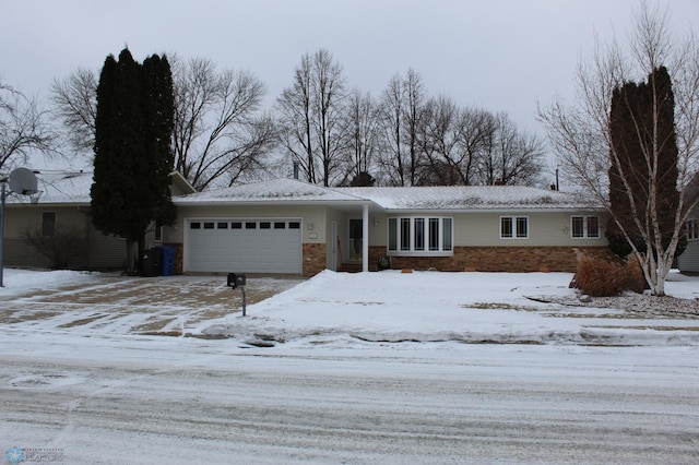 ranch-style home with a garage