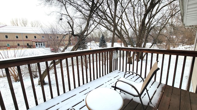 view of snow covered deck