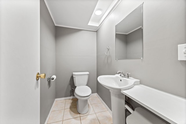 bathroom with tile patterned floors and toilet