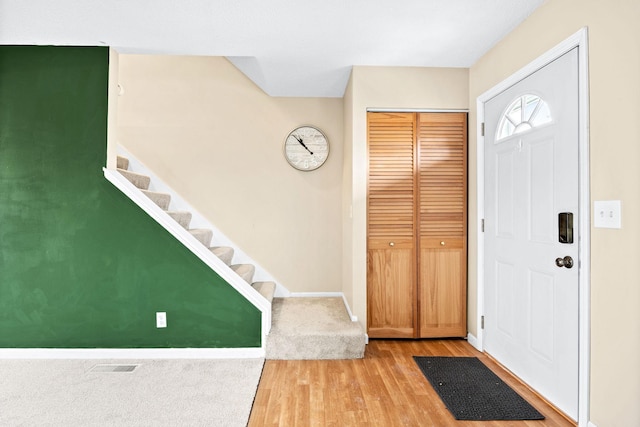 entrance foyer with hardwood / wood-style floors