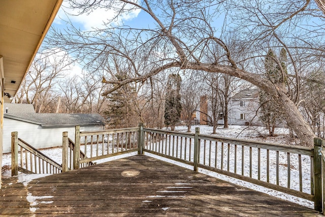 view of snow covered deck