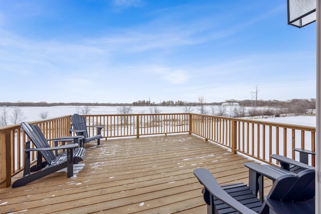 view of snow covered deck