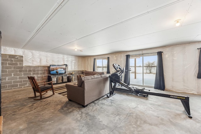 living room with concrete flooring