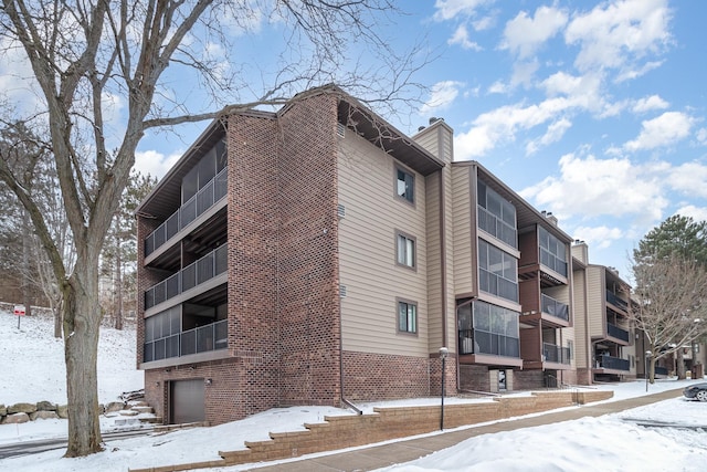 view of snow covered property