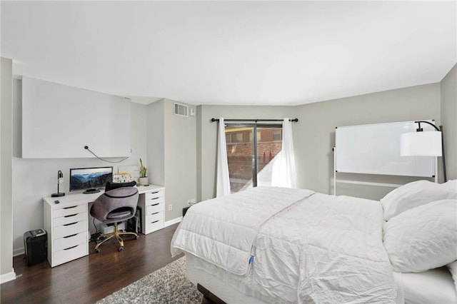 bedroom featuring dark hardwood / wood-style floors