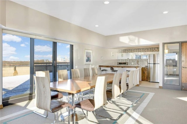 view of carpeted dining space