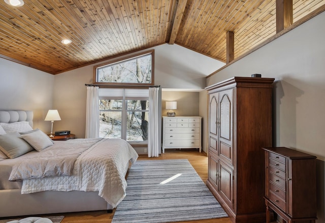 bedroom featuring vaulted ceiling with beams, wood ceiling, and light hardwood / wood-style floors